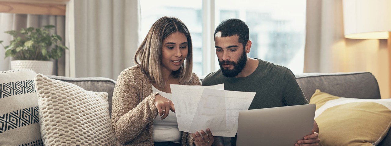 Couple going over their home insurance policy