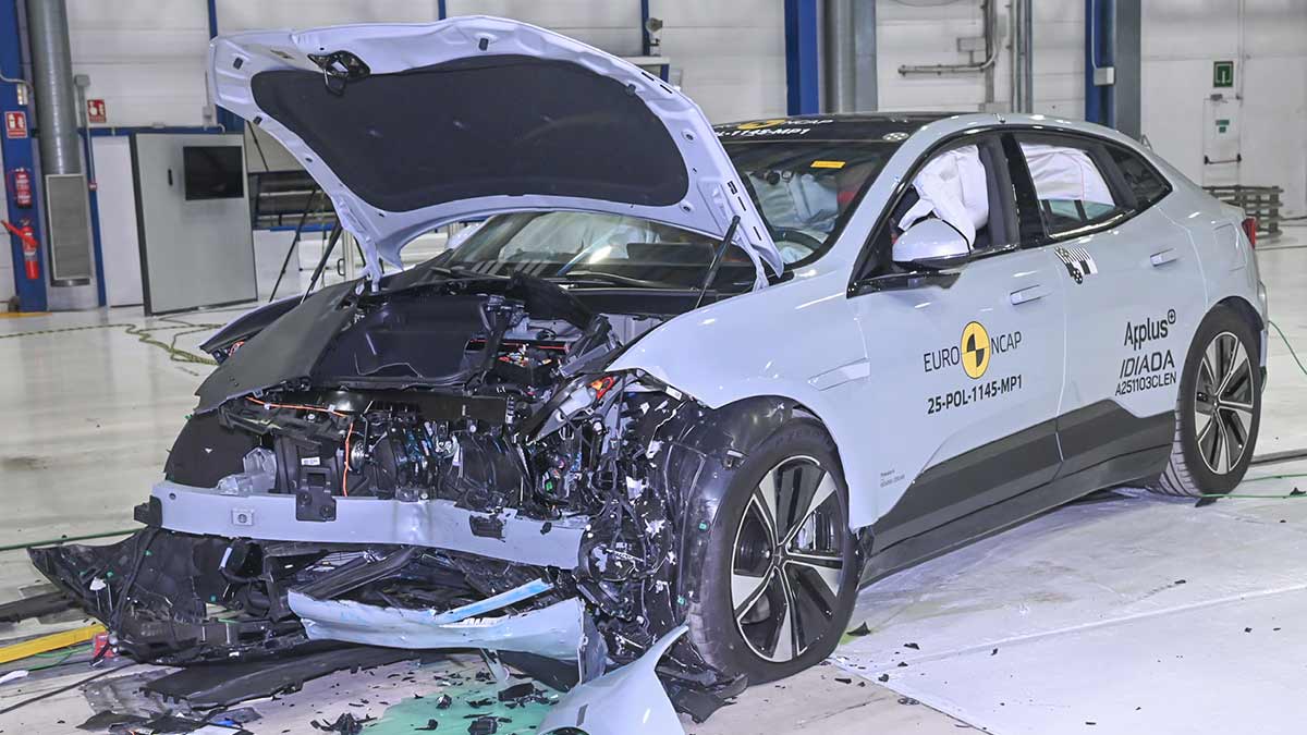 Light blue Polestar 4 SUV with heavily damaged front end after Euro NCAP frontal offset crash test.