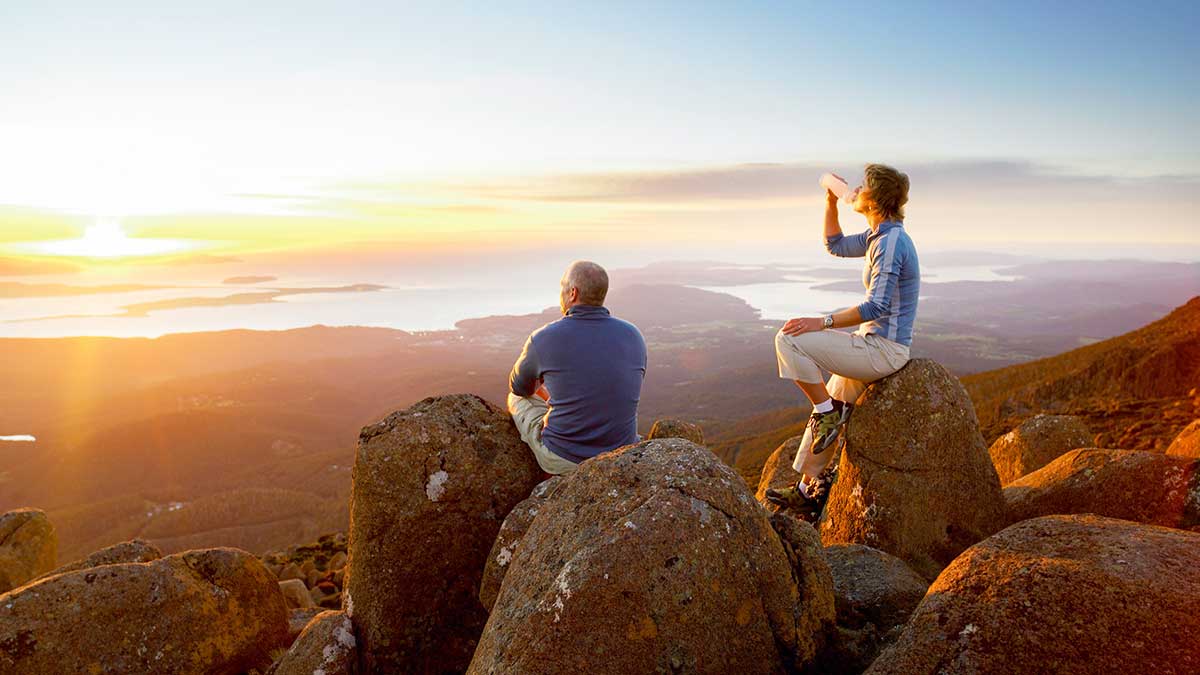 two men looking at view of Hobart from Mt Wellington