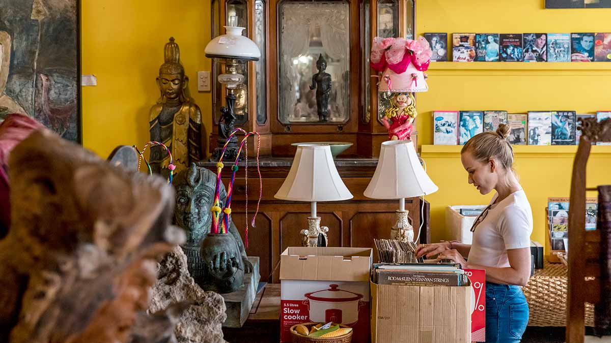A woman shops in a second-hand store in Koroit in south-west Victoria