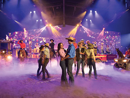 People dancing in Australian Outback Spectacular performance.