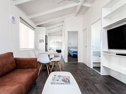 Lounge area of deluxe cabin at Cobram Resort.