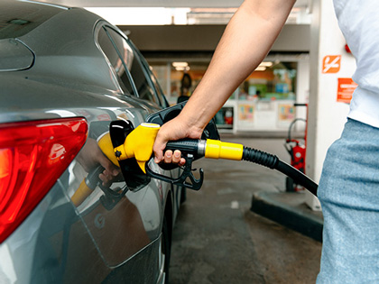 Man filling his car up with petrol.