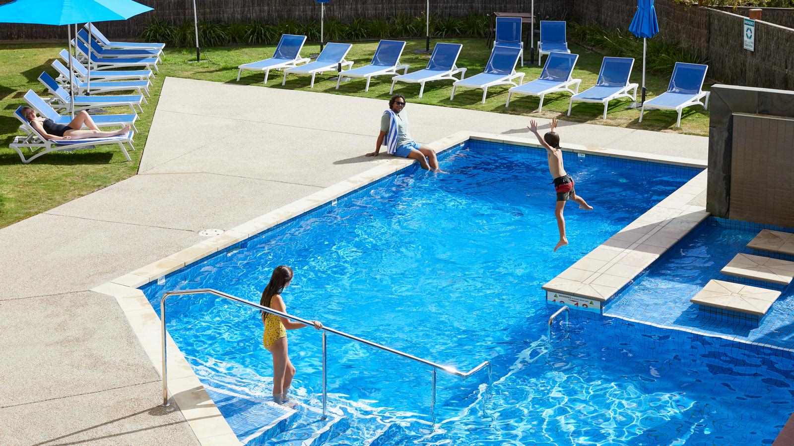 A family enjoying the pool facilities at the Goldfields resort