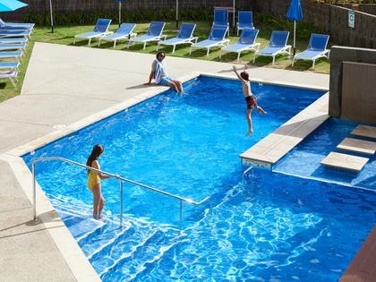 A family enjoying the pool facilities at the Goldfields resort