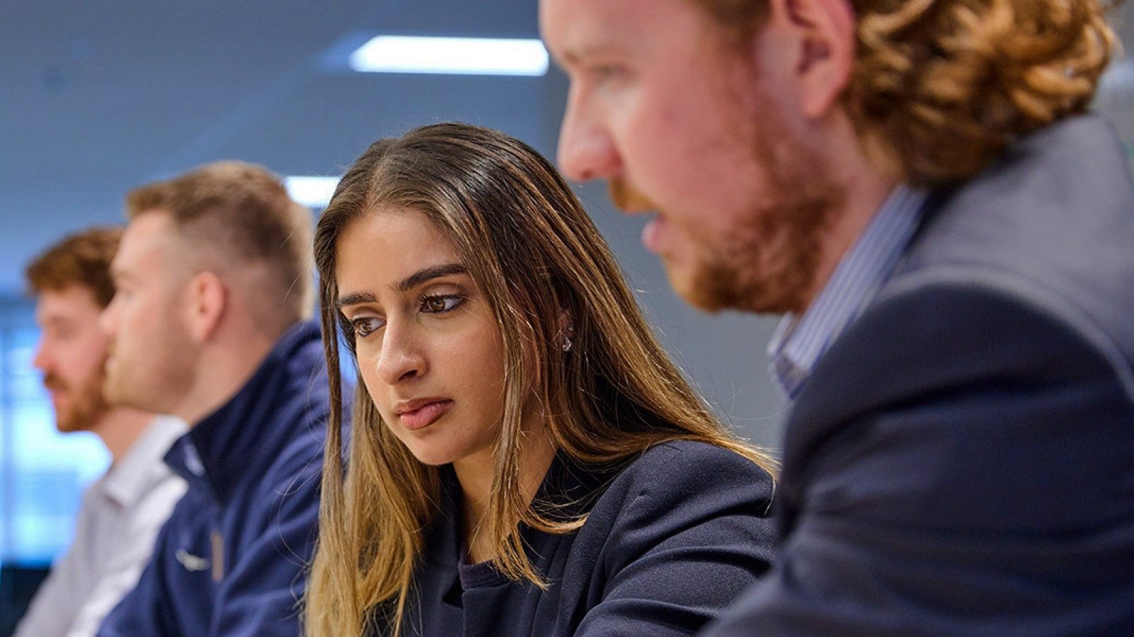 Two graduates from the 2022 program working together