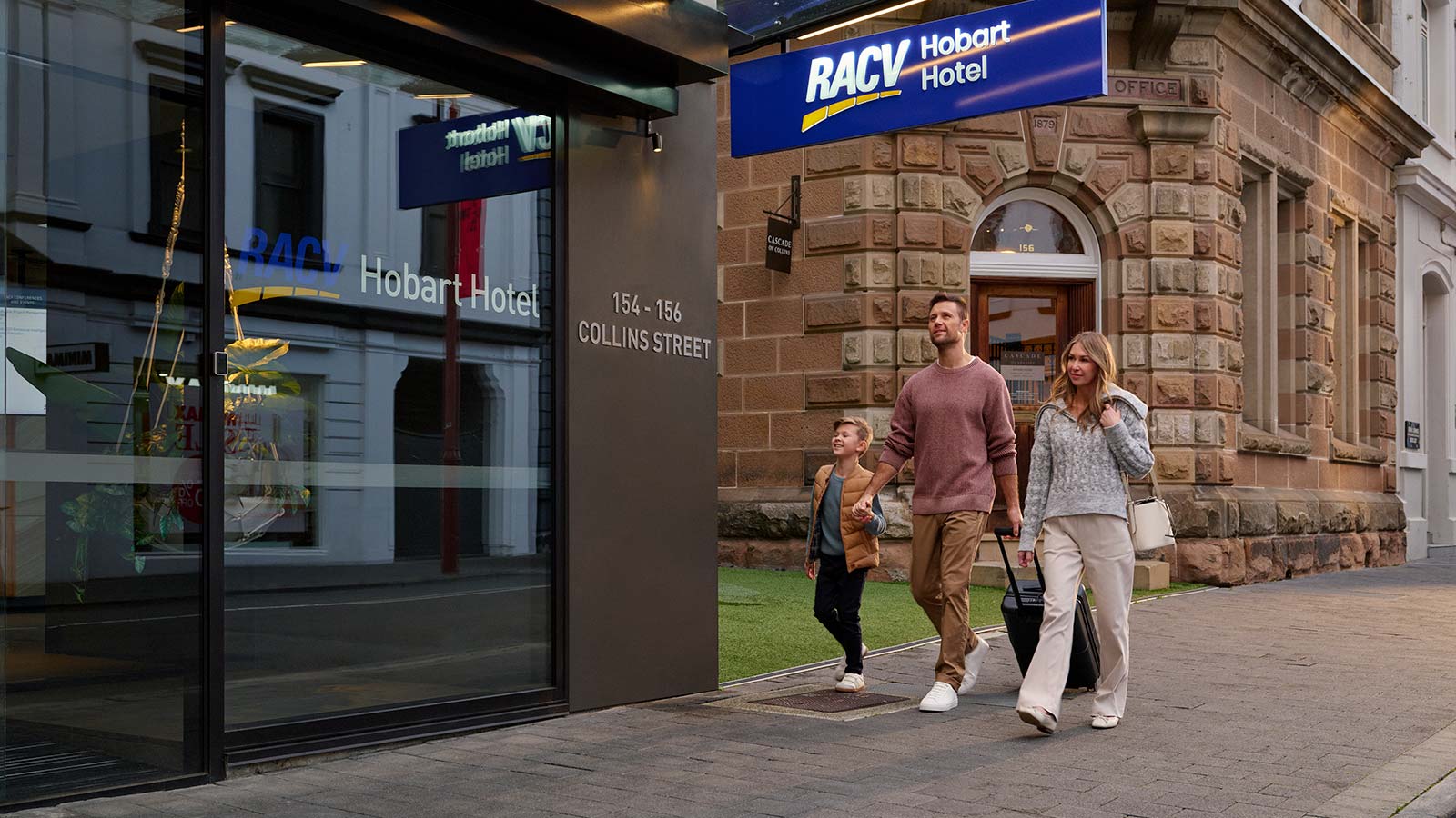 A family arriving at the RACV Hobart Hotel.