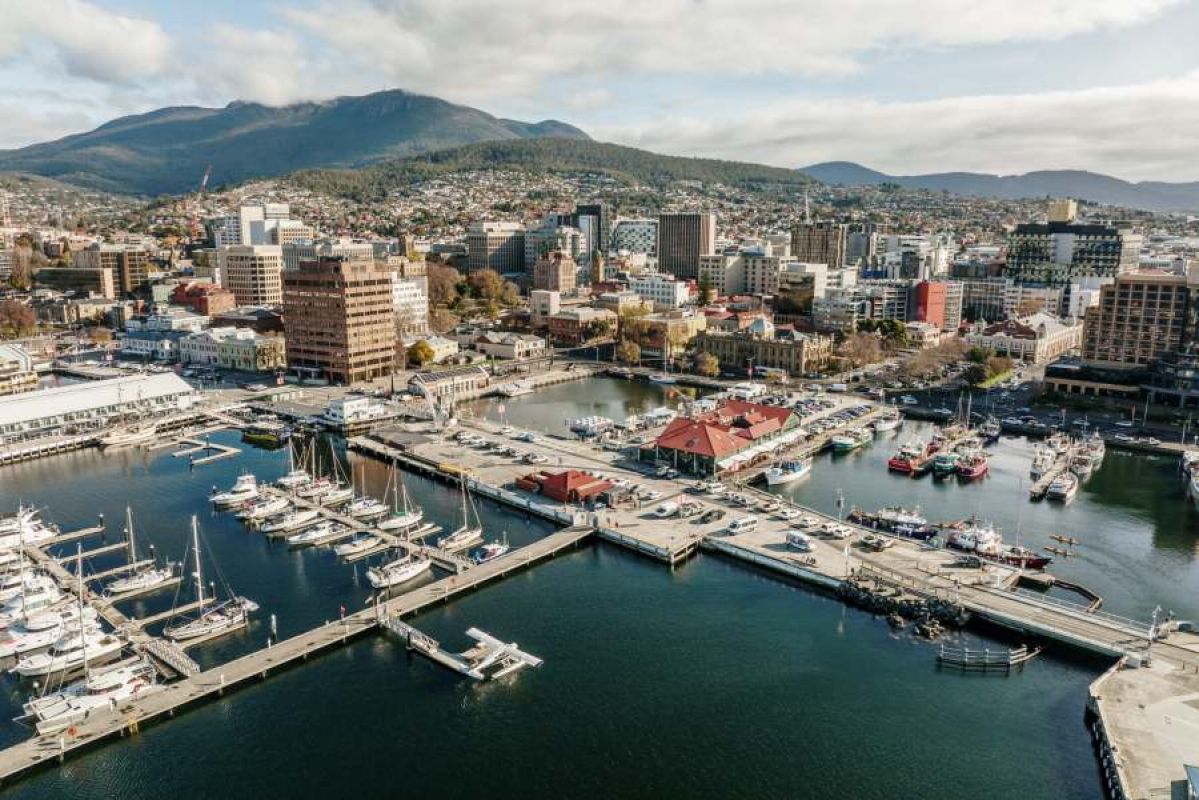 aerial view of Hobart waterfront and city with mountain behind