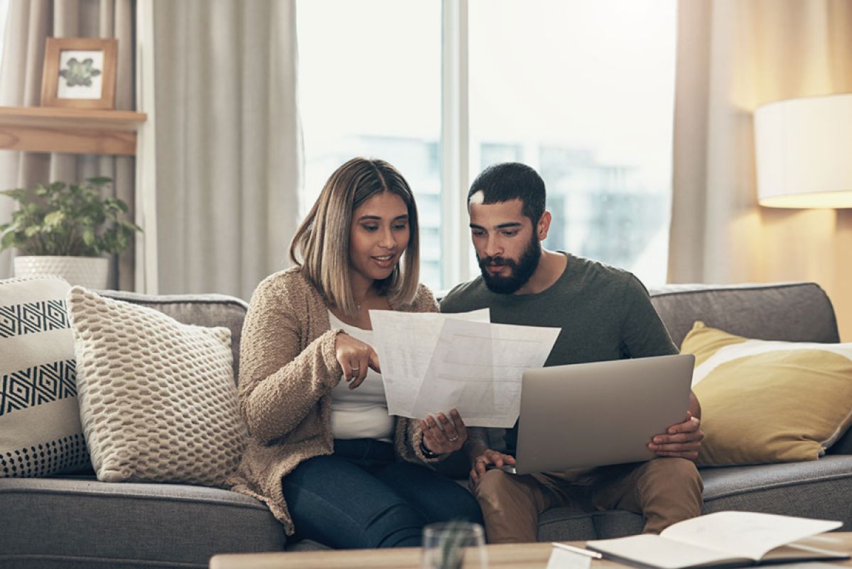 Couple going over their home insurance policy