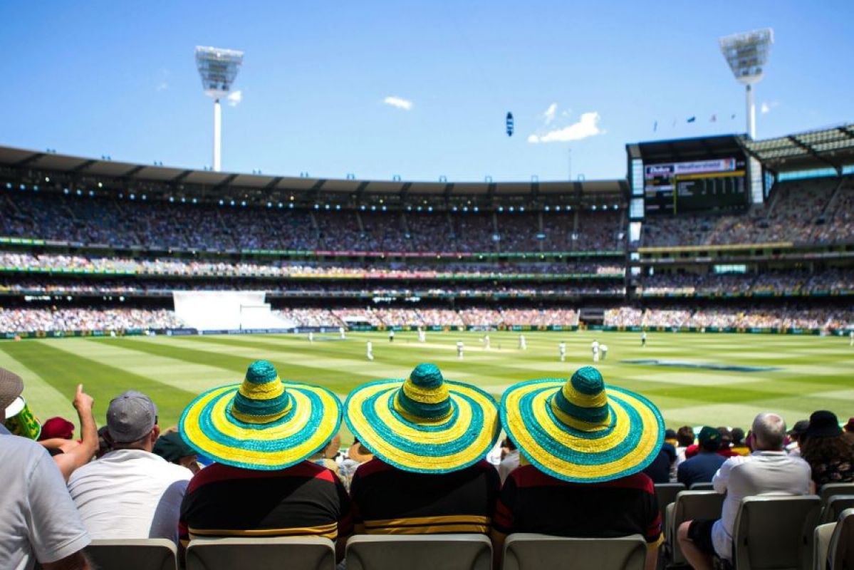 A packed crowd enjoying the boxing day test at the mcg