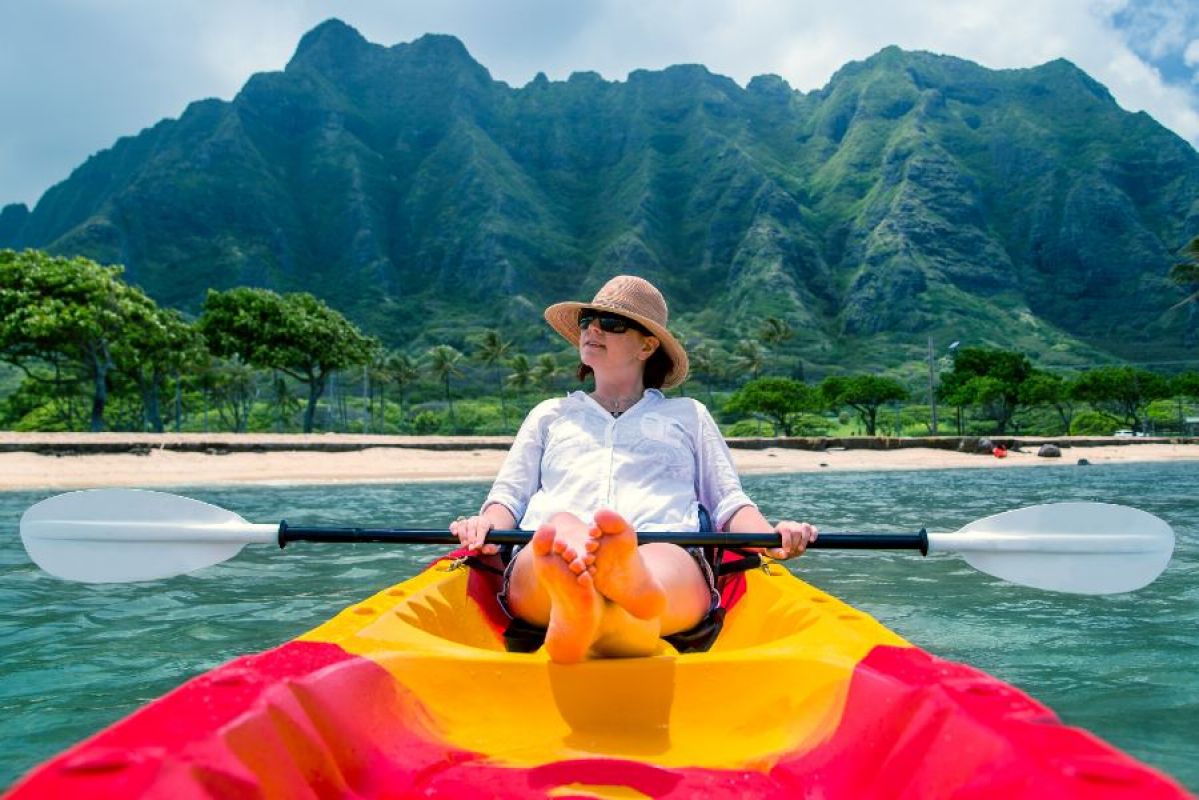 woman kayaking in Hawaiian waters