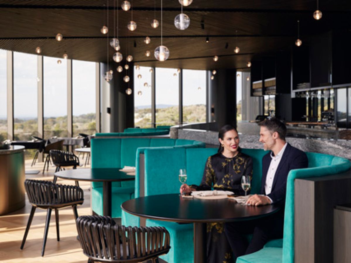 Couple having a drink together at Cape Schanck