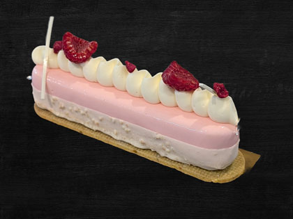 Small lychee flavoured cake resebling a bar shape.