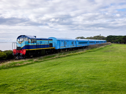 The Q train moving alongside the ocean