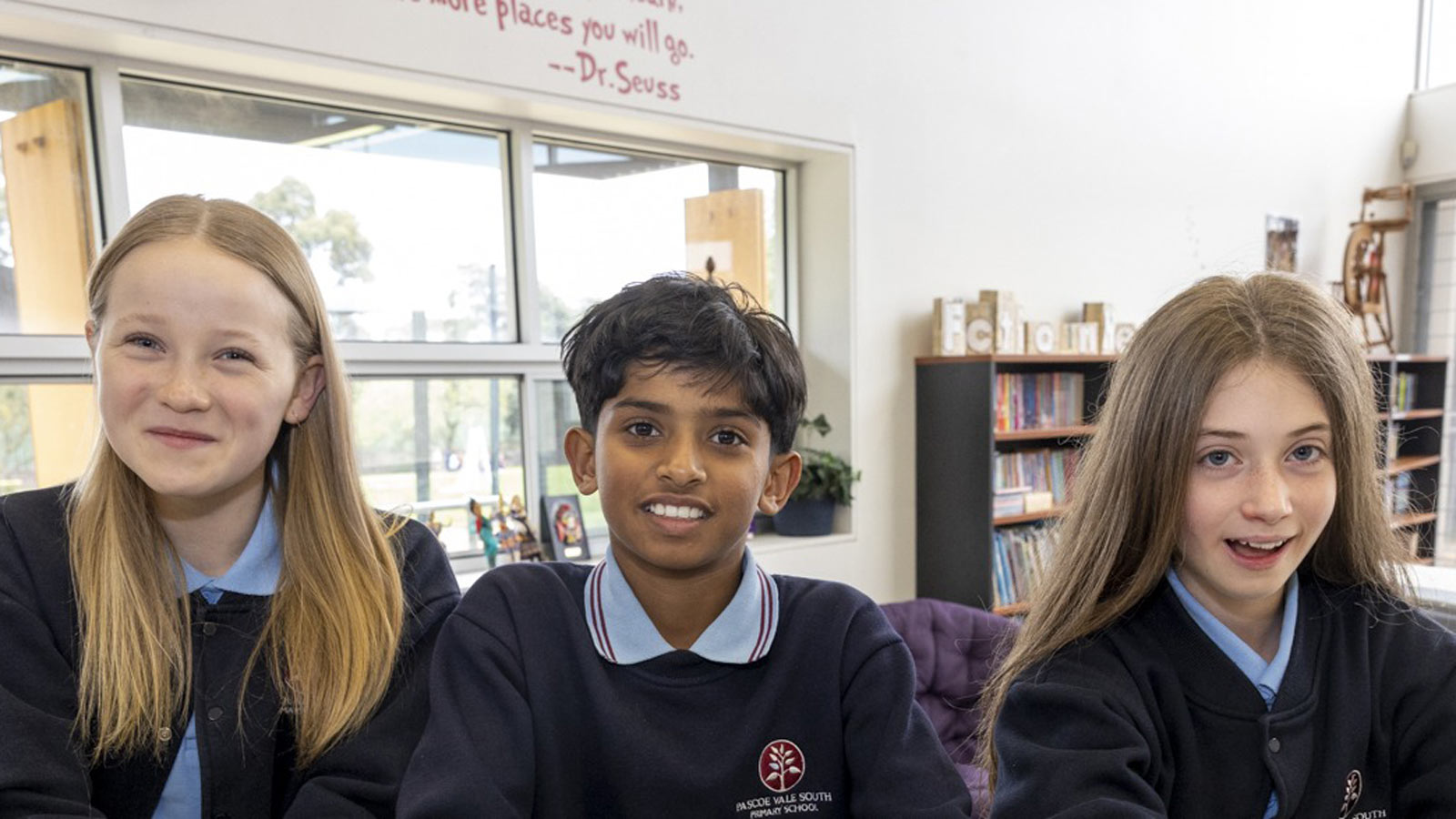 School children smiling.