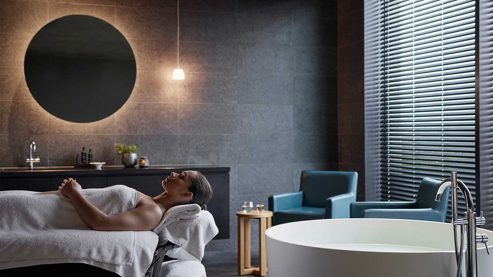 Client lying down awaiting a treatment in the Torquay one spa room.