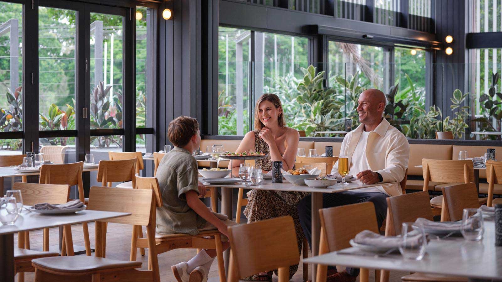 A young family dining at Amici.
